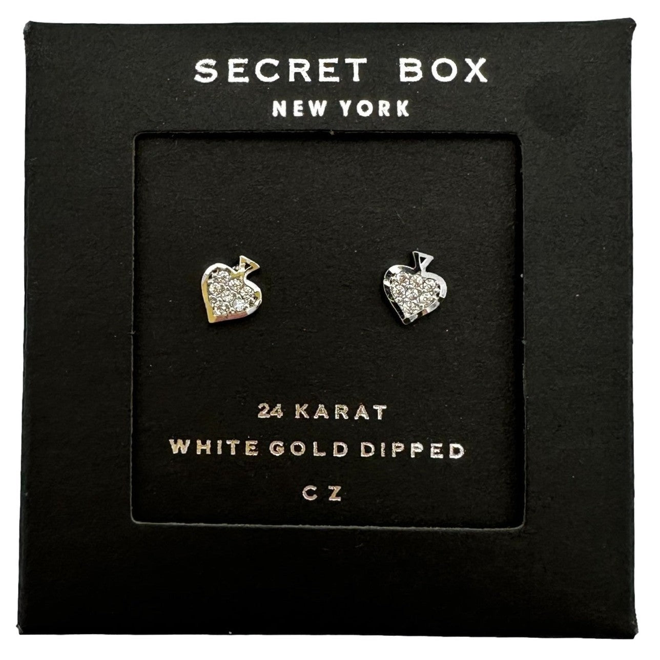 Two silver and CZ heart-shaped earrings in a black display box.